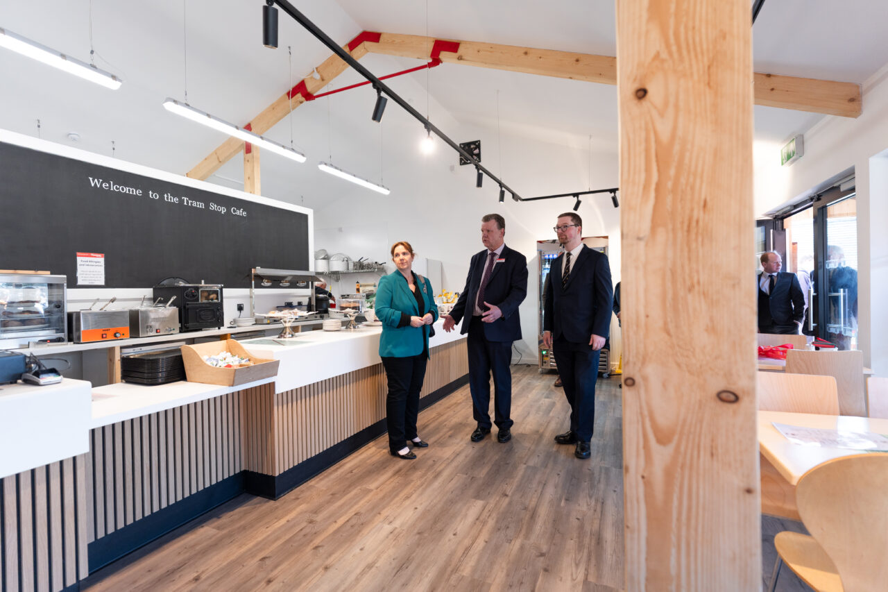 Graham Bennett and Andrew Pendleton show Claire Ward the inside of the Tramstop Cafe