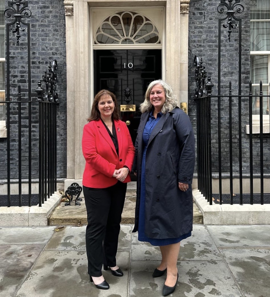 Myaor of the East Midlands stood next to the Transport Secretary Heidi Alexander. Both are stood outside the black door of Number 10 Downing Street in London.