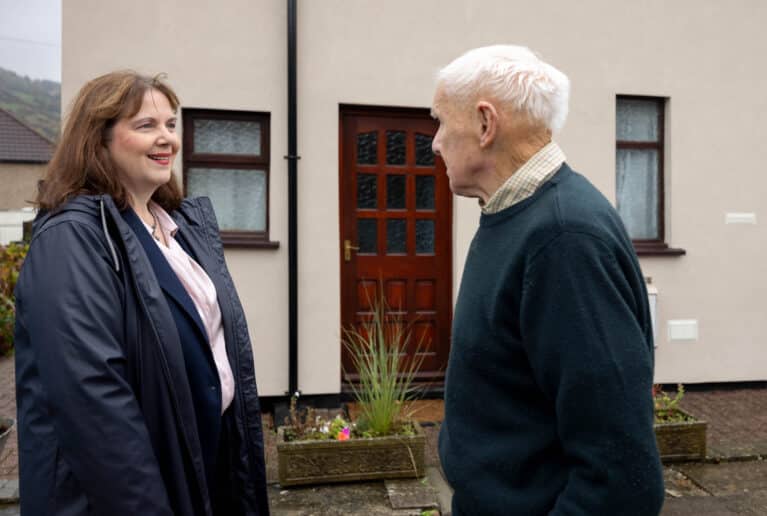 Mayor Claire Ward meets a resident in Matlock who has received energy efficiency improvements to their home for free.