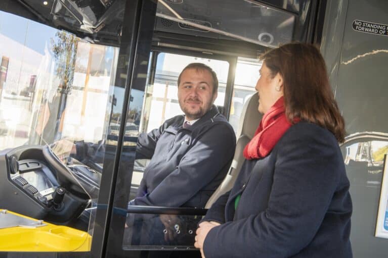 Mayor Claire talking to a bus driver