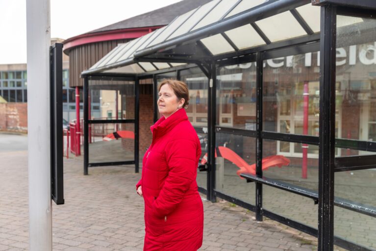 Mayor of the East Midlands, Claire Ward at a bus stop.