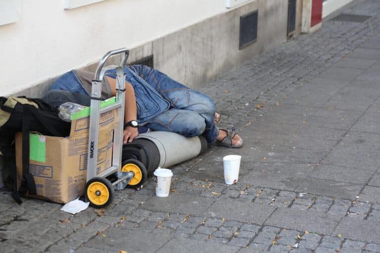 A homeless person on the streets.