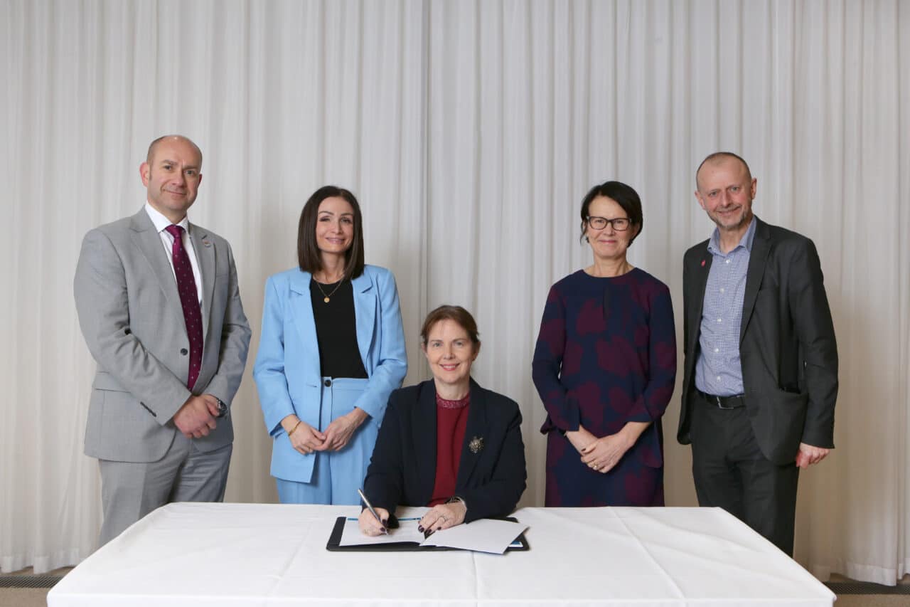 Mayor Claire Ward signs the University Compact, flanked by, from left, Prof Keith McLay, University of Derby deputy Vice Chancellor, EMCCA chief executive Amy Harhoff, University of Nottingham Vice Chancellor Prof Jane Norman and Nottingham Trent University Vice Chancellor Prof Dave Petley.