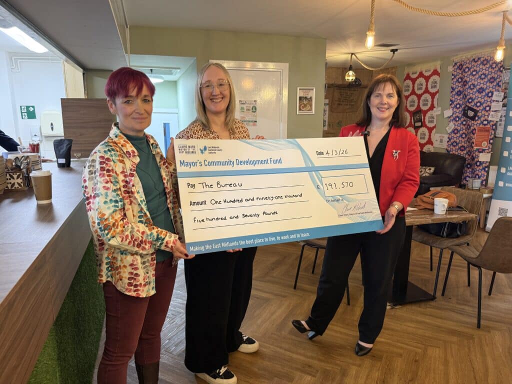 Mayor Claire, right, visited Gamesley Community Centre to hand over a cheque to Natalie Rhodes, The Bureau chief officer, centre, and Helen Thornhill, Gamesley Community Centre chief officer.