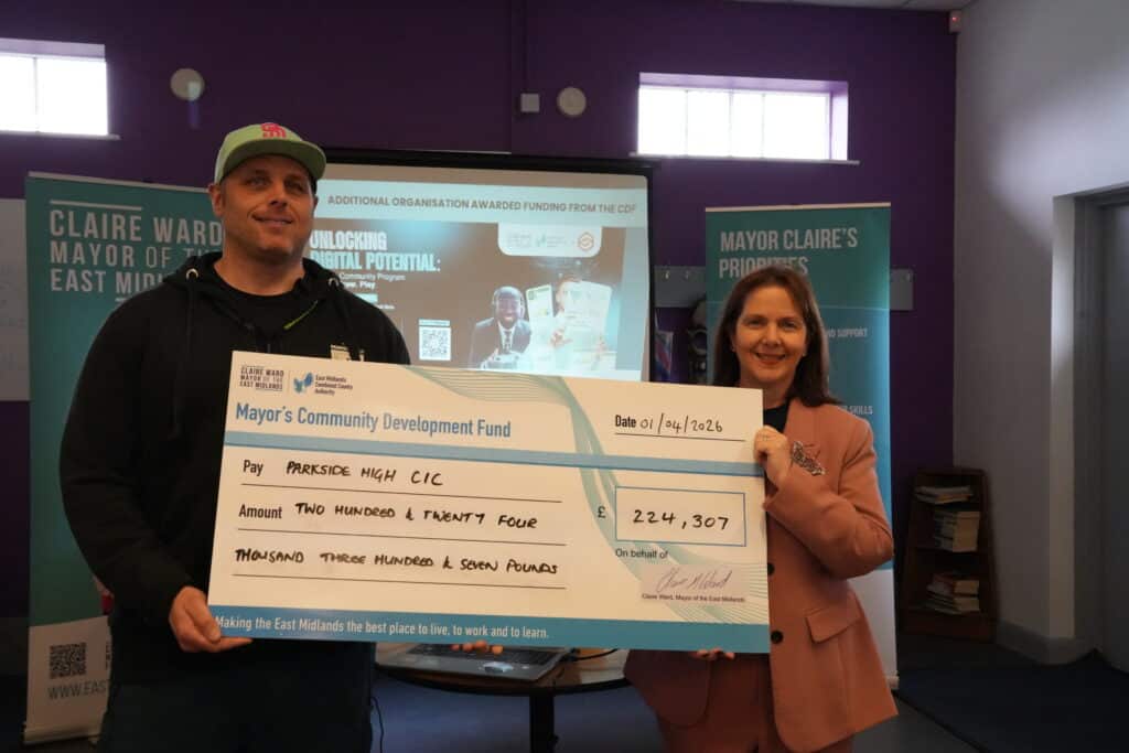 Mayor Claire Ward hands over money from her Community Development Fund to Parkside High CIC in Cotmanhay.