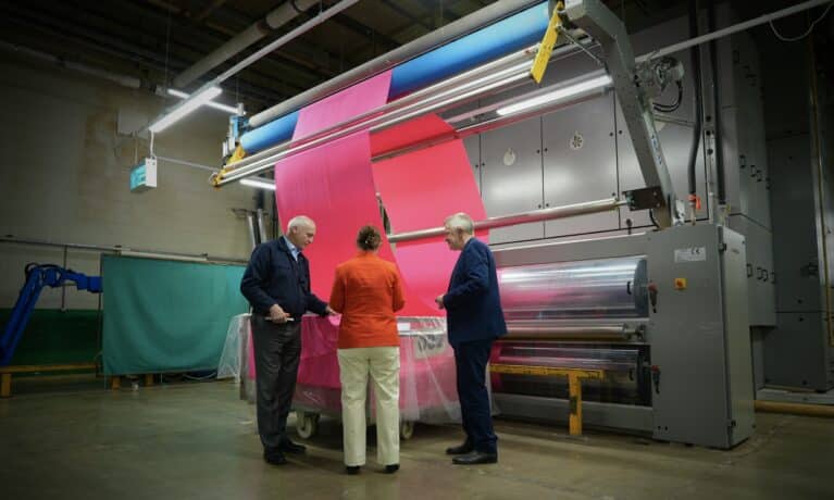 Mayor Claire being shown Toray Textiles Factory