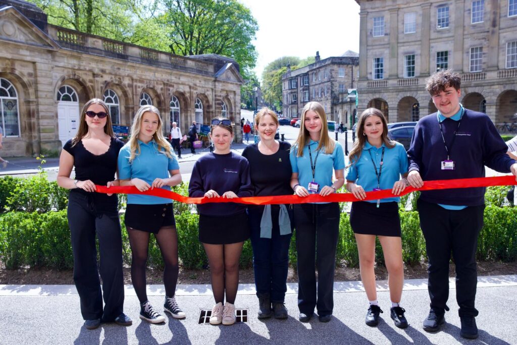Mayor Claire at the finish line of The Loop in Buxton, with travel and tourism students from Mansfield's West Nottinghamshire College, who had joined the Mayor on a previous leg.
