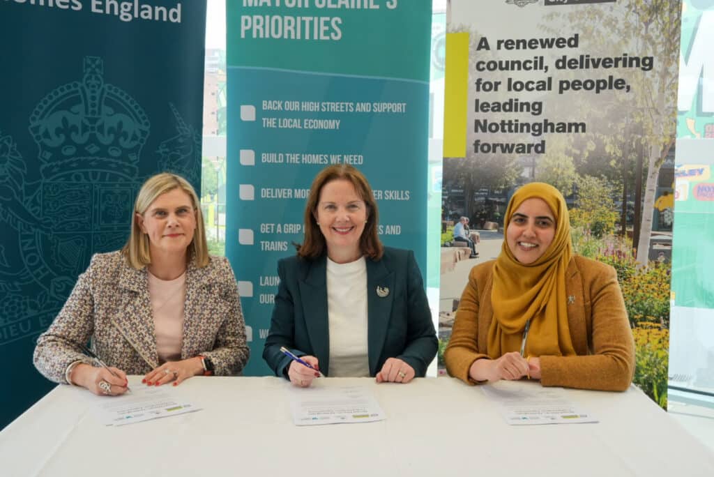 Jo Nugent, Mayor Claire Ward, and Cllr Neghat Khan sign a Broadmarsh collaboration agreement at Nottingham Central Library