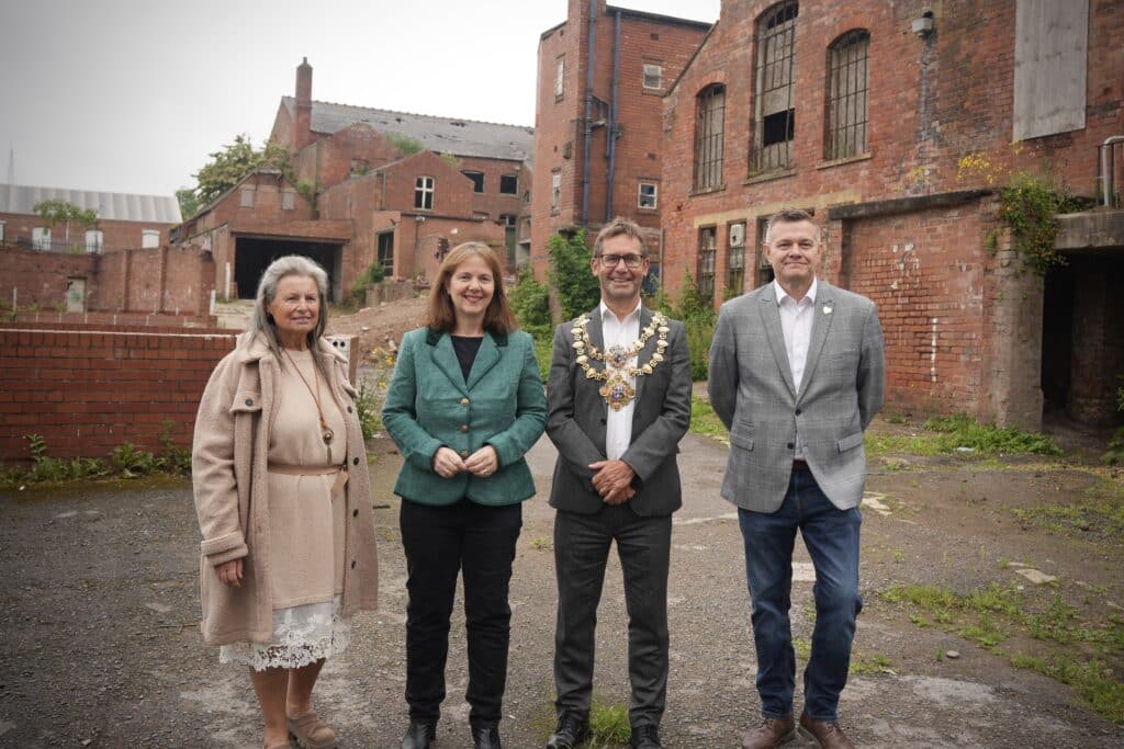 From left, Councillor Anne Callaghan, Mansfield District Council portfolio for housing, Mayor Claire Ward, Mayor of Mansfield Andy Abrahams and Councillor Craig Whitby, deputy mayor of Mansfield, at the White Hart Street site.