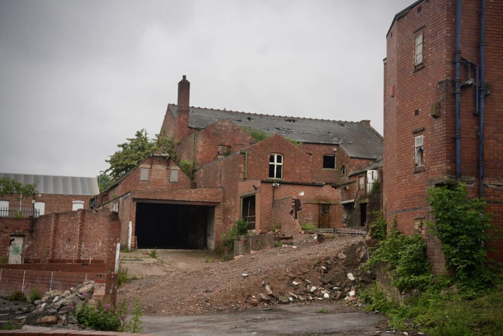 Derelict buildings off White Hart Street will be demolished or restored for housing.