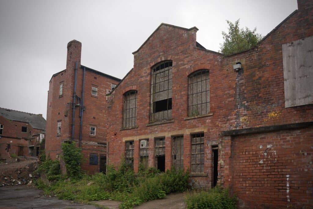 Derelict buildings off White Hart Street will be demolished or restored for housing.