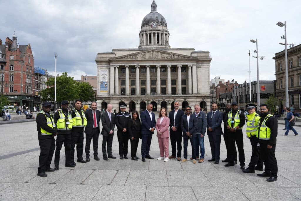 Mayor Claire Ward and PCC Gary Godden with officers at the launch of Operation SafeTravel.