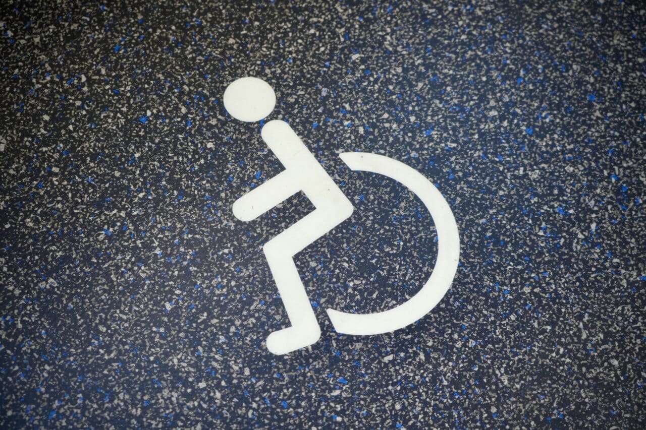 Wheelchair user logo inside a bus