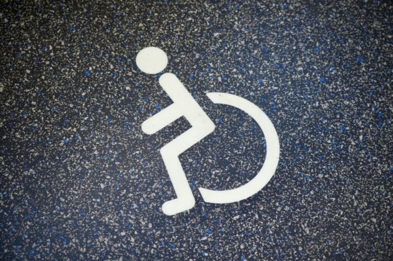 Wheelchair user logo inside a bus