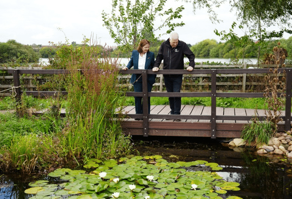 Mayor Claire and CEO Paul Wilkinson by pond at Attenborough Nature Reserve