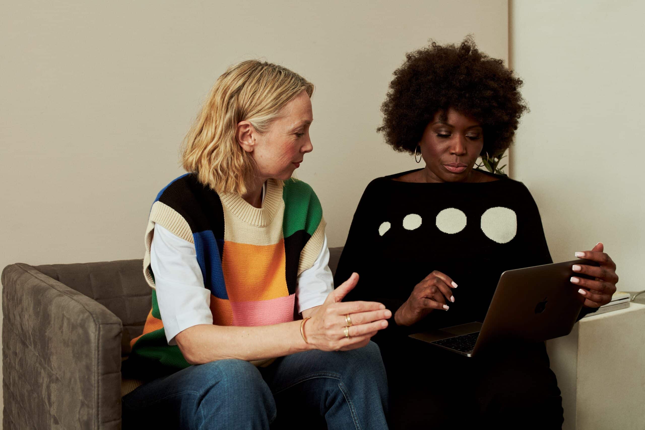 two women working together