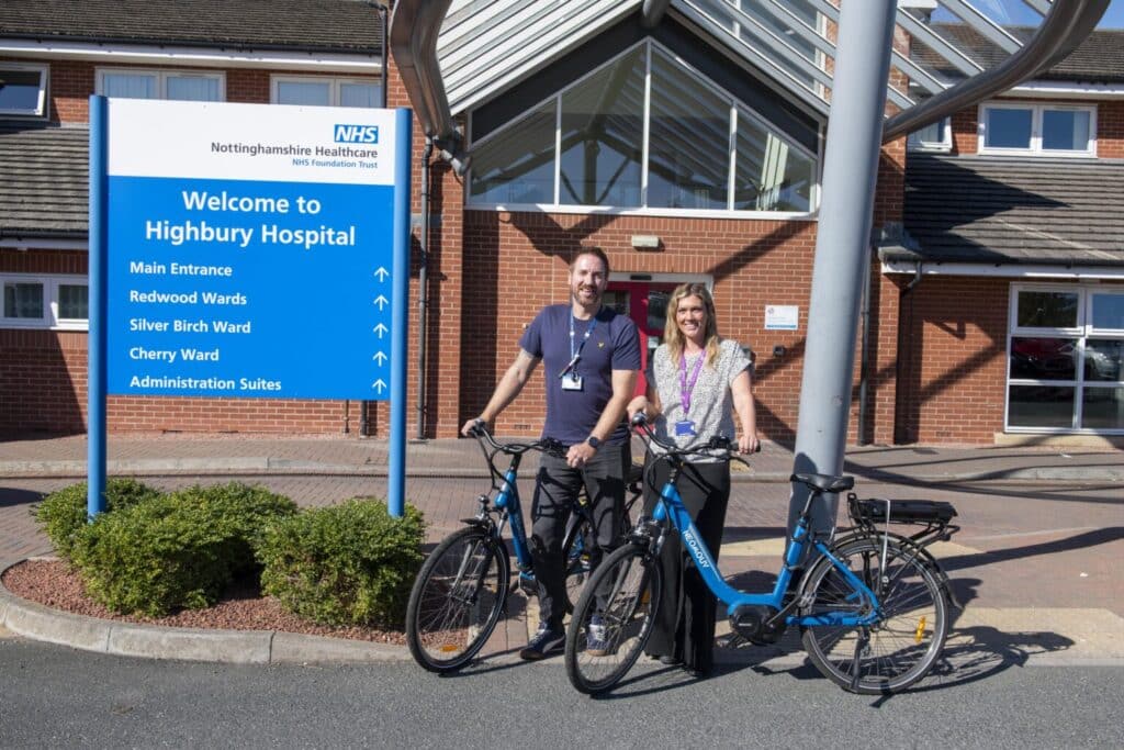 Jo Baker and Patrick Crolla from the team at Highbury Hospital with their e-bikes, funded through a Workplace Travel Grant.